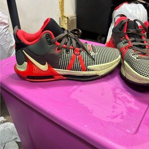 Nike Red and Black Sneakers with Yellow Accents
